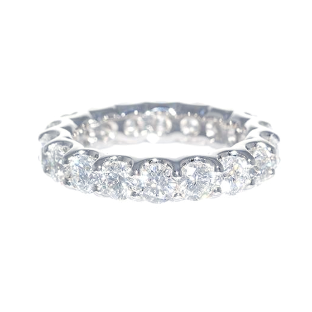 A platinum eternity band ring with shared prong set diamonds 3.83 carats
