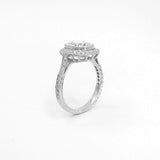 Side view of custom made platinum cushion cut diamond engagement ring