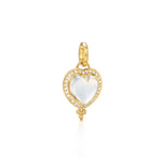 An 18k yellow gold diamond pavé heart pendant with a clear natural rock crystal heart and surrounding diamond accents.