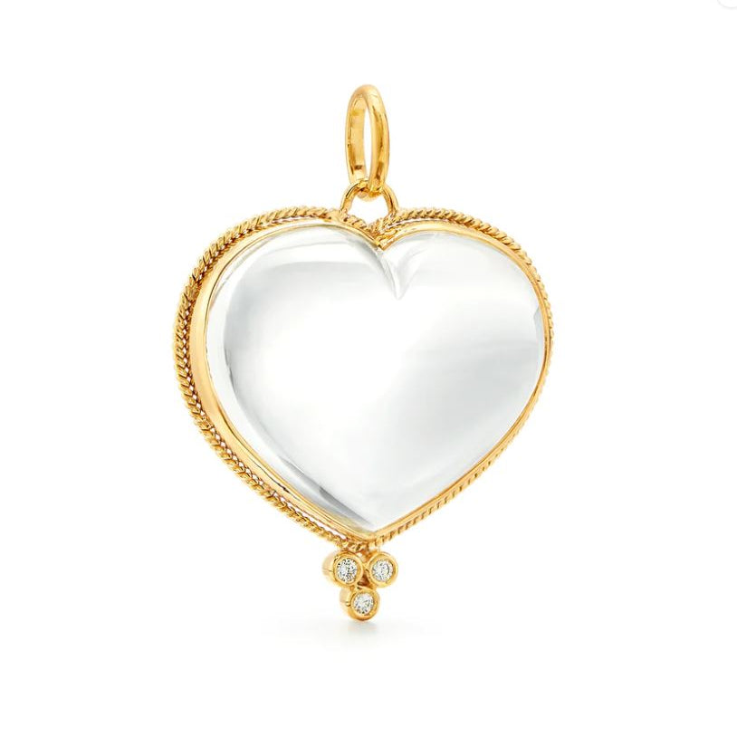 An 18k yellow gold pendant with a heart-shaped rock crystal centerpiece and small diamond accents - large size Temple Heart pendant
