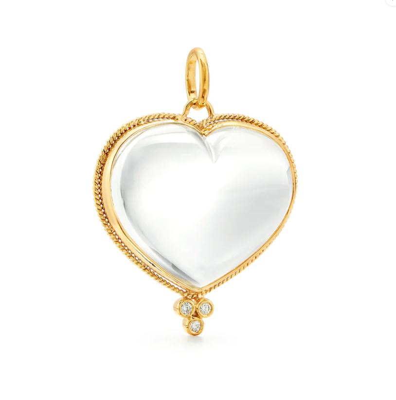An 18k yellow gold pendant with a heart-shaped rock crystal centerpiece and small diamond accents - large size Temple Heart pendant