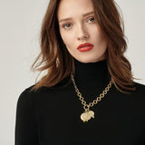 Woman wearing Temple Angel Pendants 