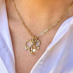 Woman wearing Temple St Clair Pendants