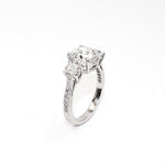 Three Stone Round Brilliant Cut Diamond Engagement Ring in Platinum
