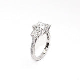 Three Stone Round Brilliant Cut Diamond Engagement Ring in Platinum