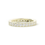 A 18k yellow gold bead set diamond band ring