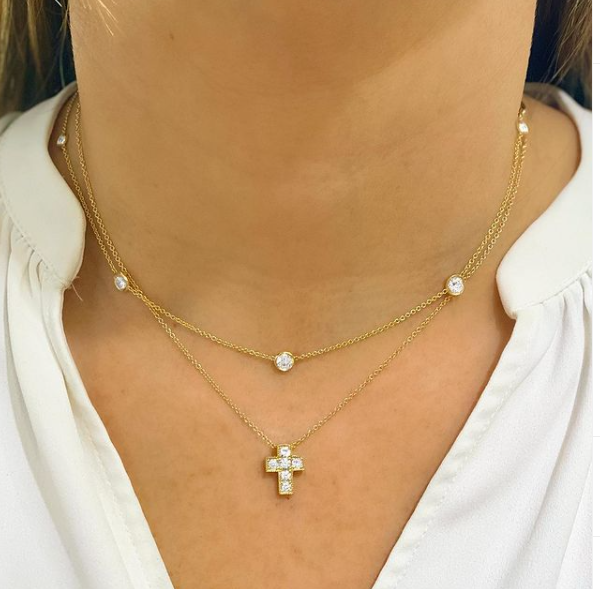 Woman wearing a diamond by the yard necklace