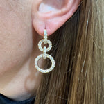 Woman wearing Gumuchian convertible earrings