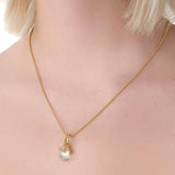 Woman wearing Temple St Clair 18K yellow gold Granulted Amulet