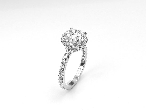 Platinum Solitaire Round Brilliant Diamond Ring with Pave Band and Halo
