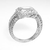 Platinum Emerald Cut Diamond Ring with Halo